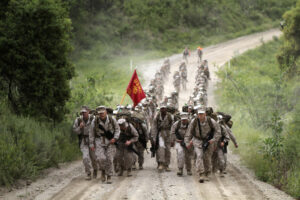 CAMP PENDLETON, Calif. -- Approximately 130 Marines and sailors with the 11th Marine Expeditionary Unit trek through the hills during a hike here April 13. The unit hiked 14 1/2 miles to build mental and physical readiness and to prepare for possible movements during their upcoming deployment.